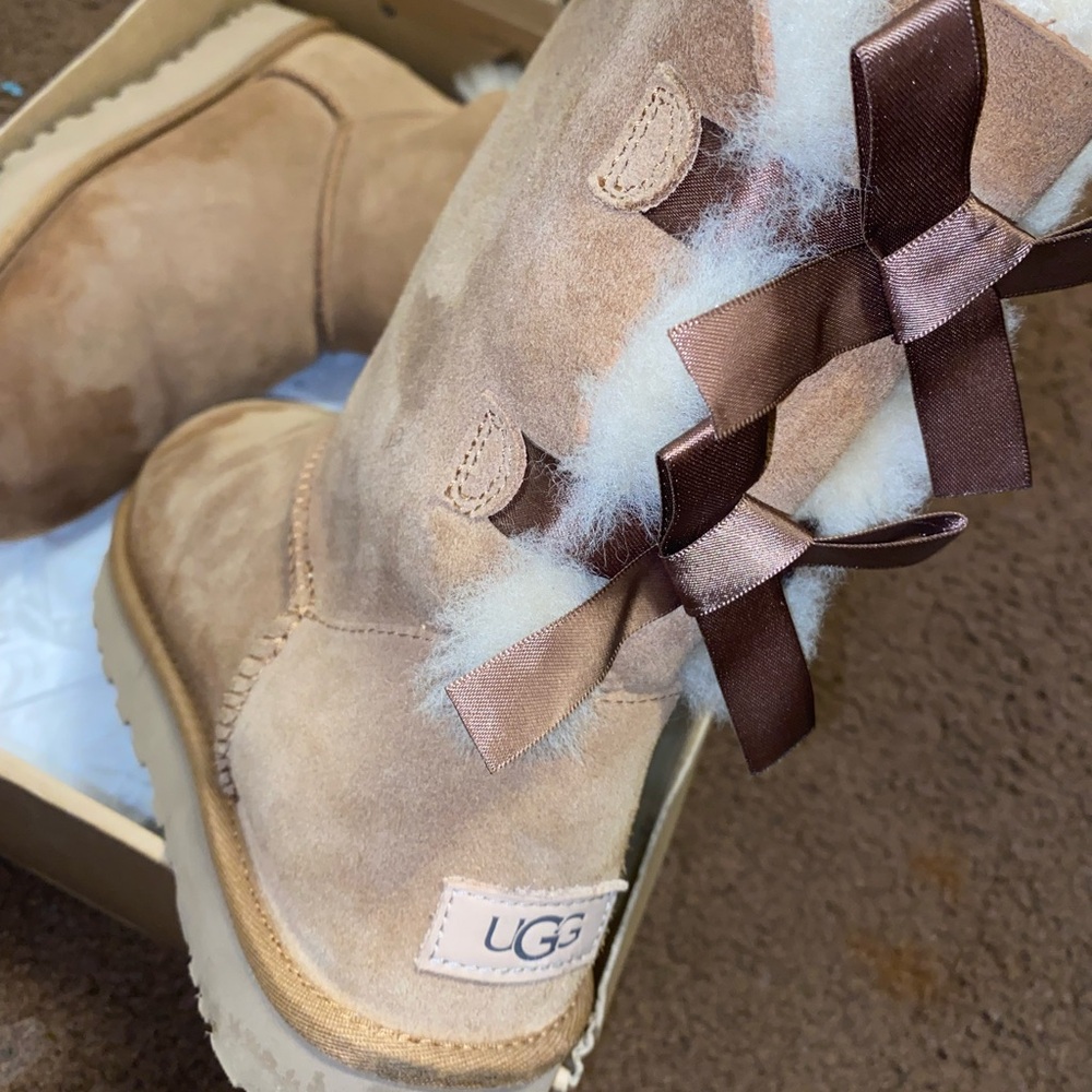 Brown ugg boots with bows